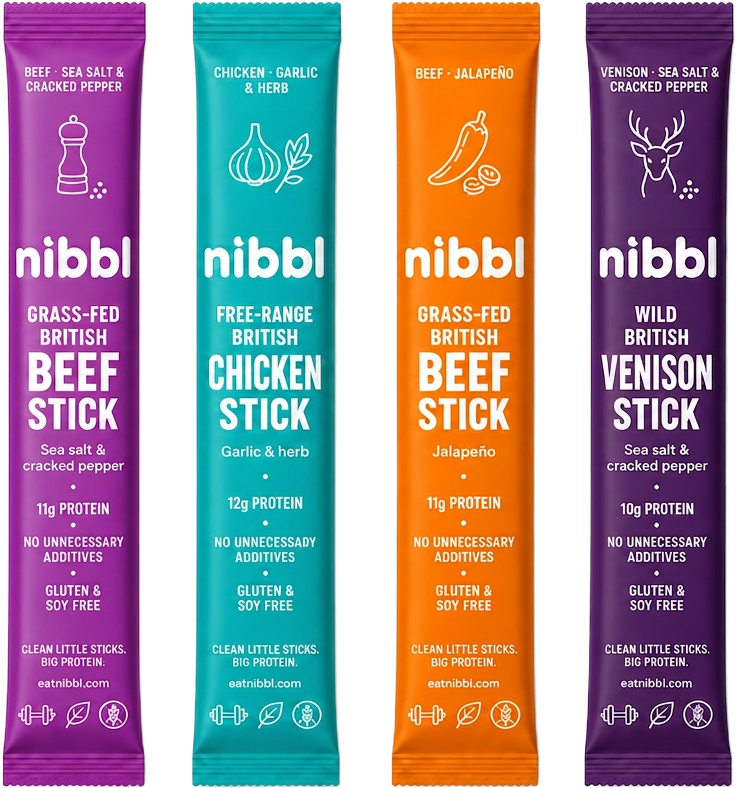 Four Nibbl protein stick packs in purple, teal, orange and deep purple